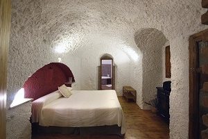 Hotel con jacuzzi en la habitación en Granada